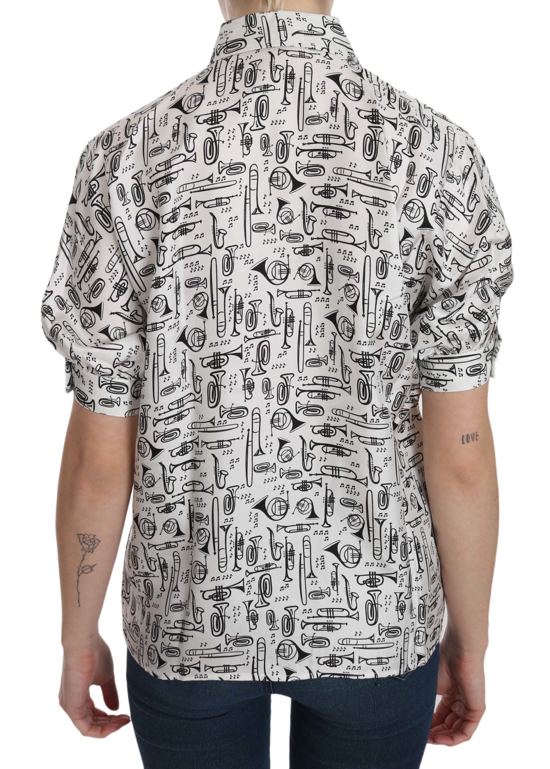 Weiße Bluse mit Kragen und Musikinstrumenten-Motiv
