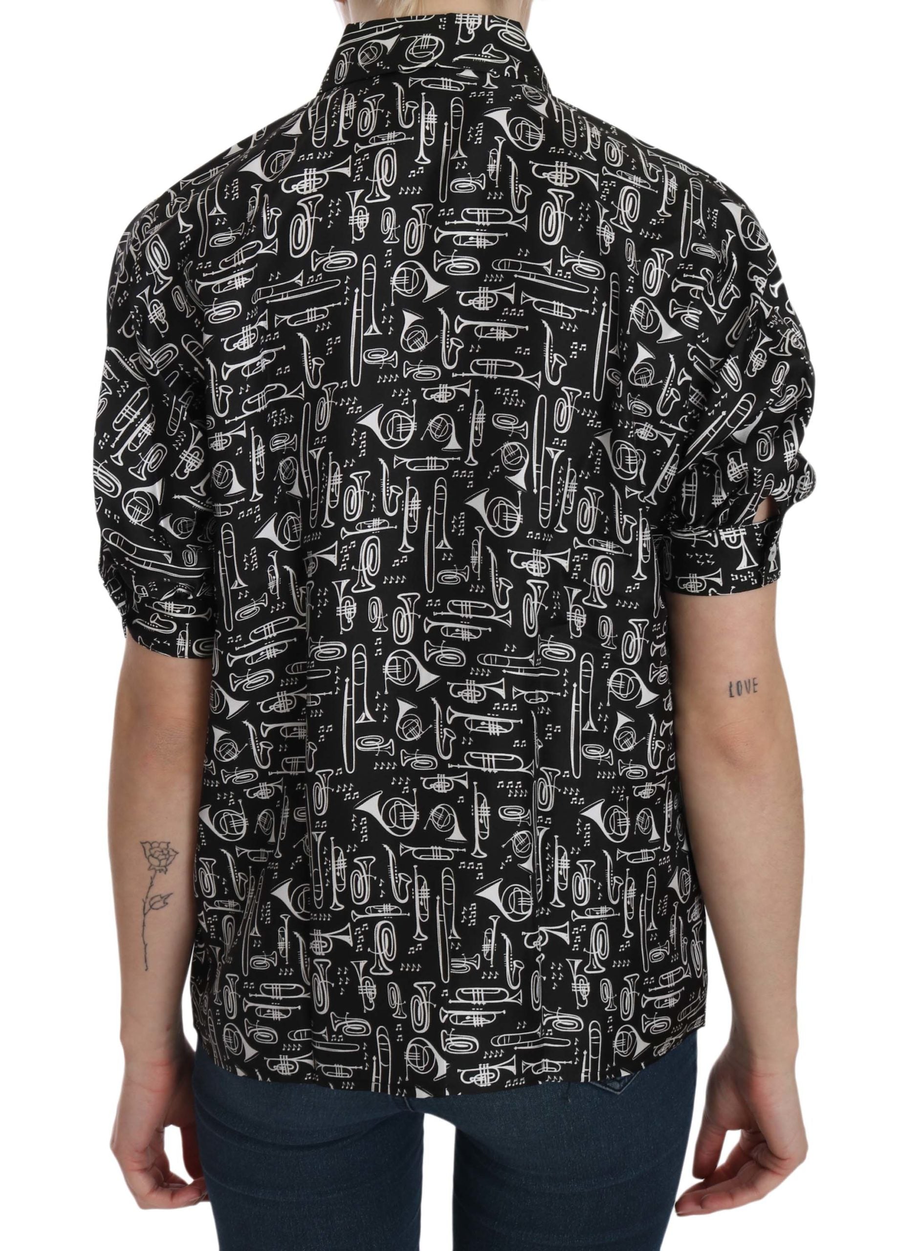 Schwarze Bluse mit Kragen und Musikinstrumenten-Motiv
