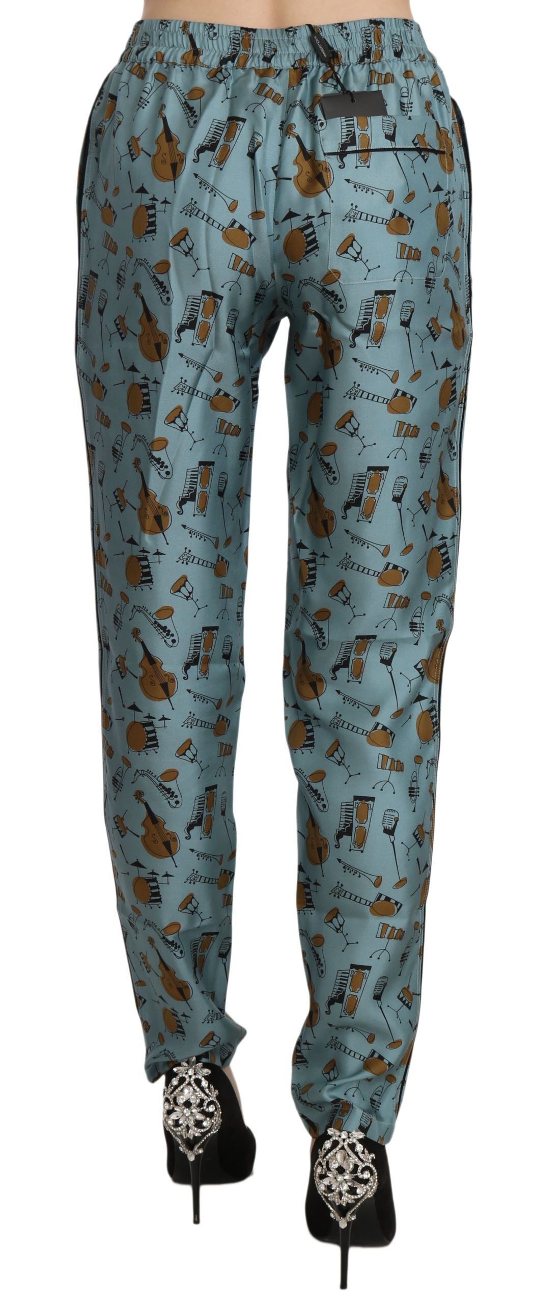 Blaue Karottenhose mit Musikinstrumenten-Print