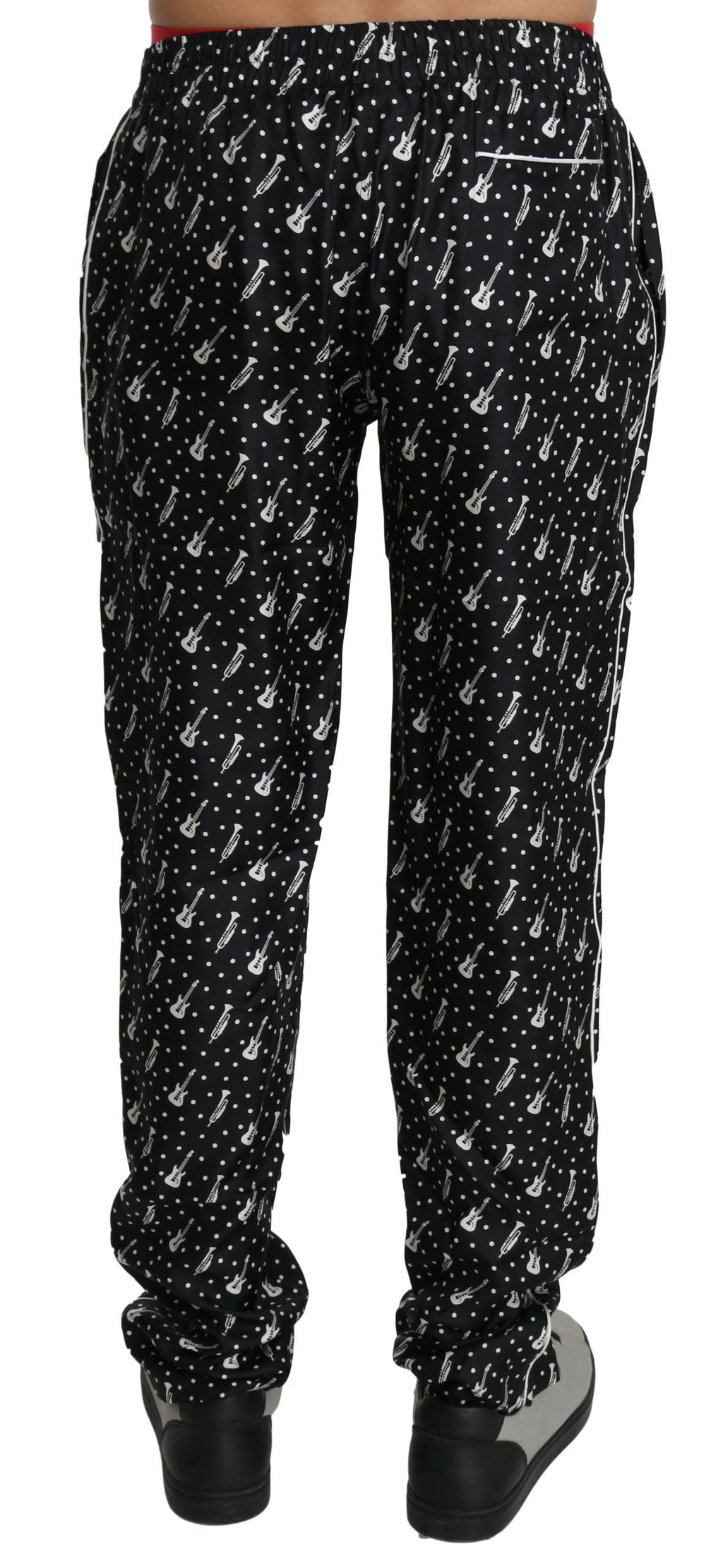 Schwarze Seidenhose mit Musikinstrumenten