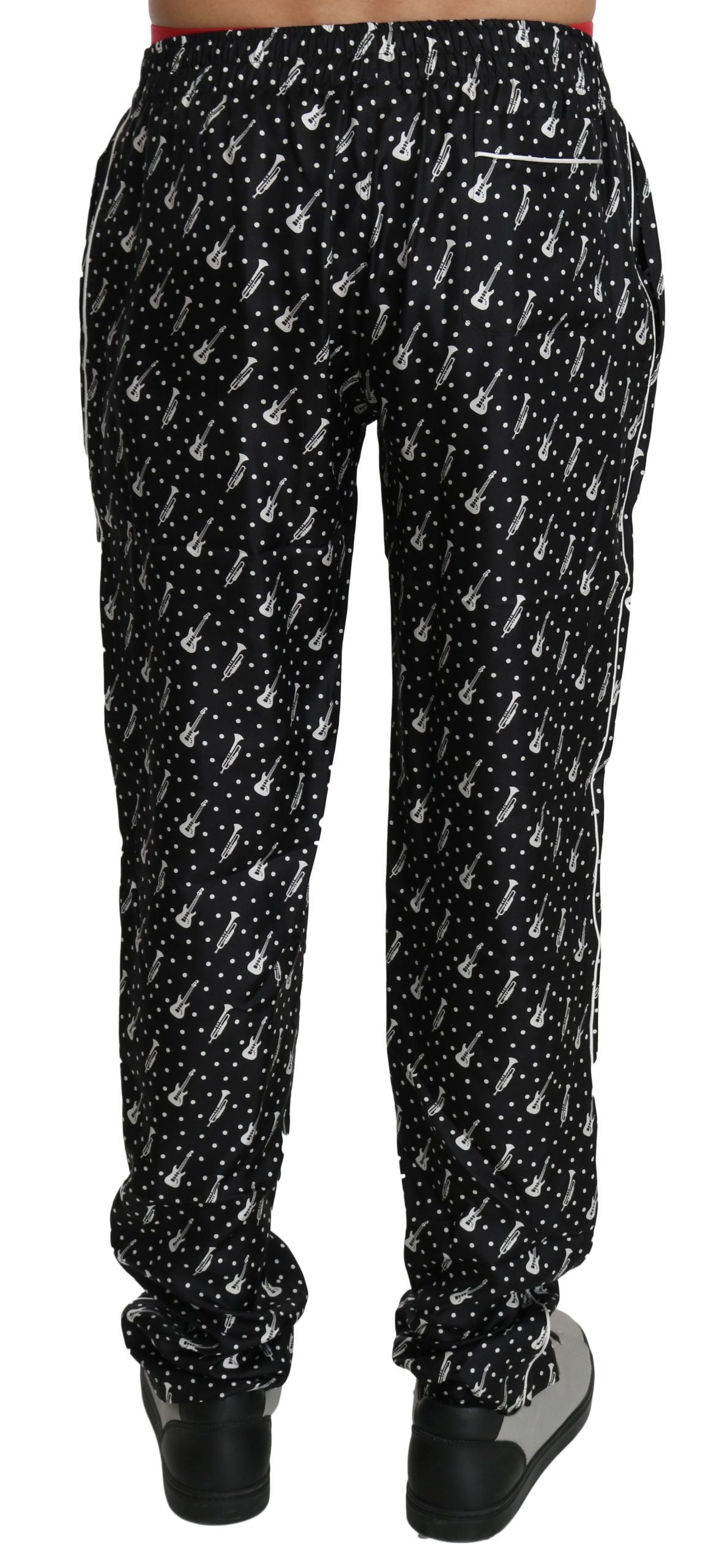 Schwarze Seidenhose mit Musikinstrumenten