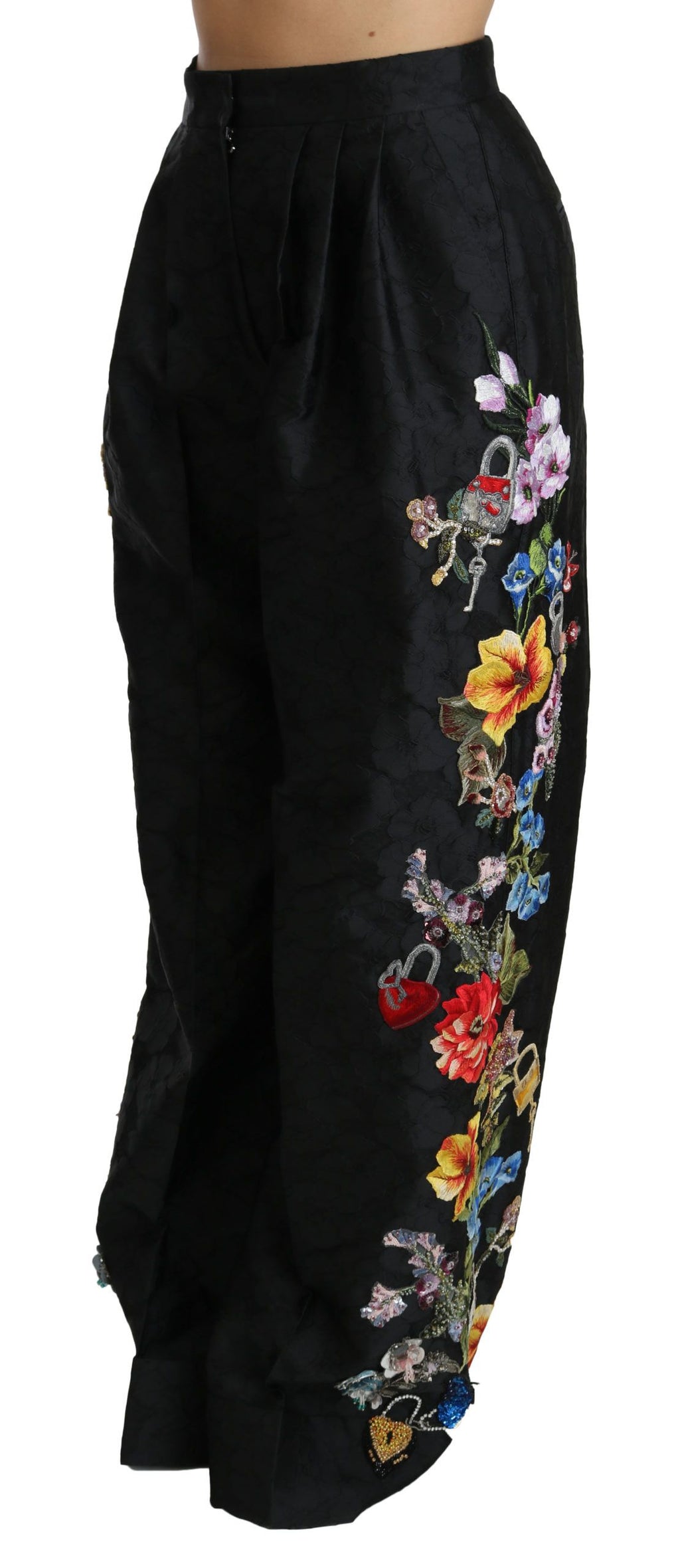 Schwarze Brokathose mit Blumenmuster und Pailletten