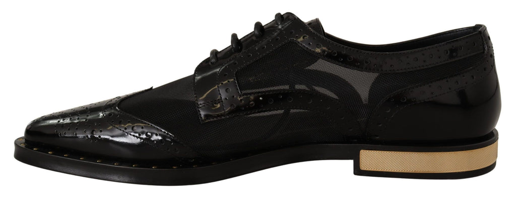 Schwarze Broques aus transparentem Leder mit Flügelkappe