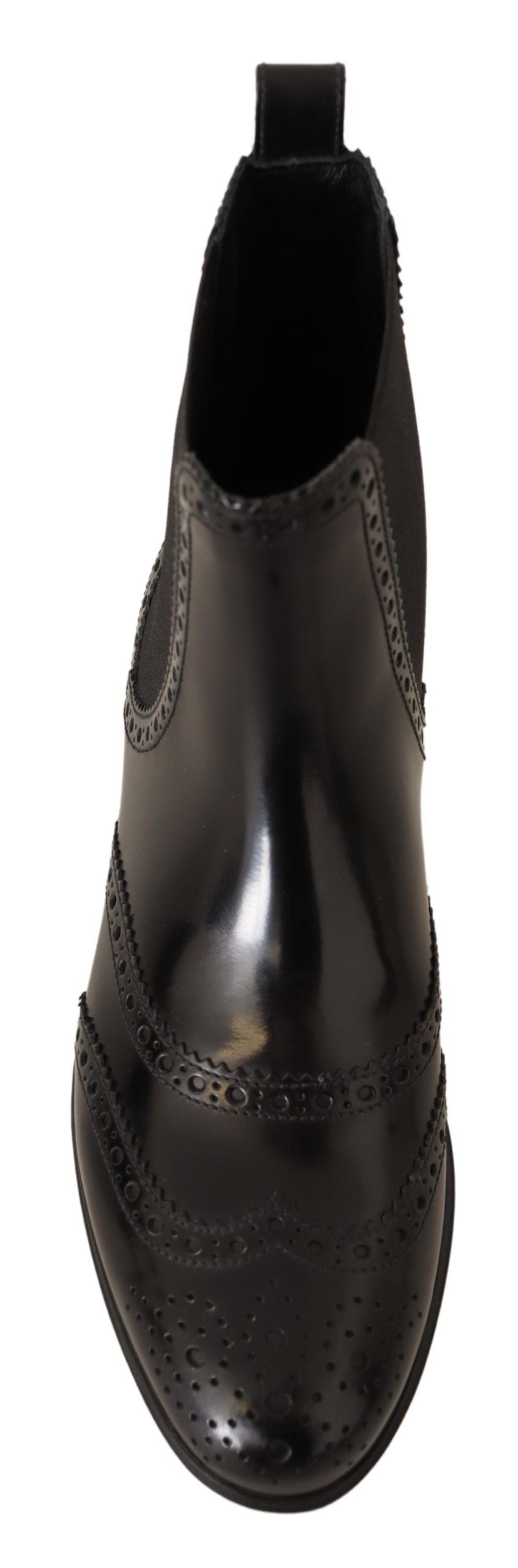 Schwarze, knöchelhohe, flache Stiefel aus Leder