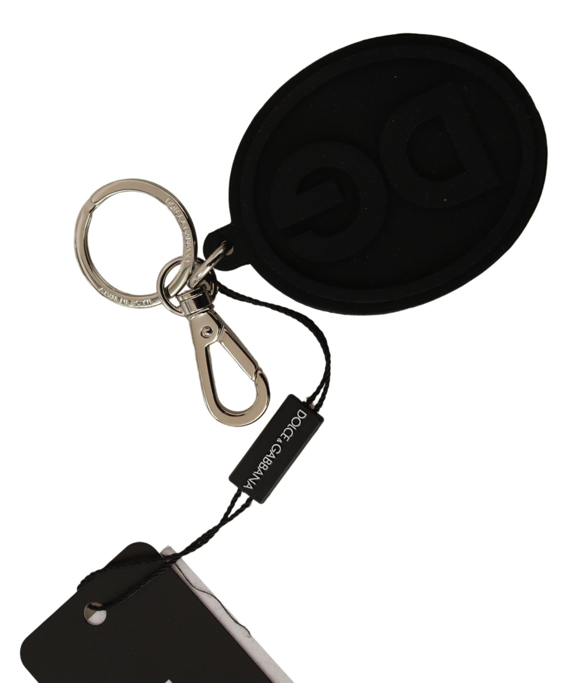 Schlüsselanhänger aus schwarzem Gummi mit DG-Logo und silbernem Messing