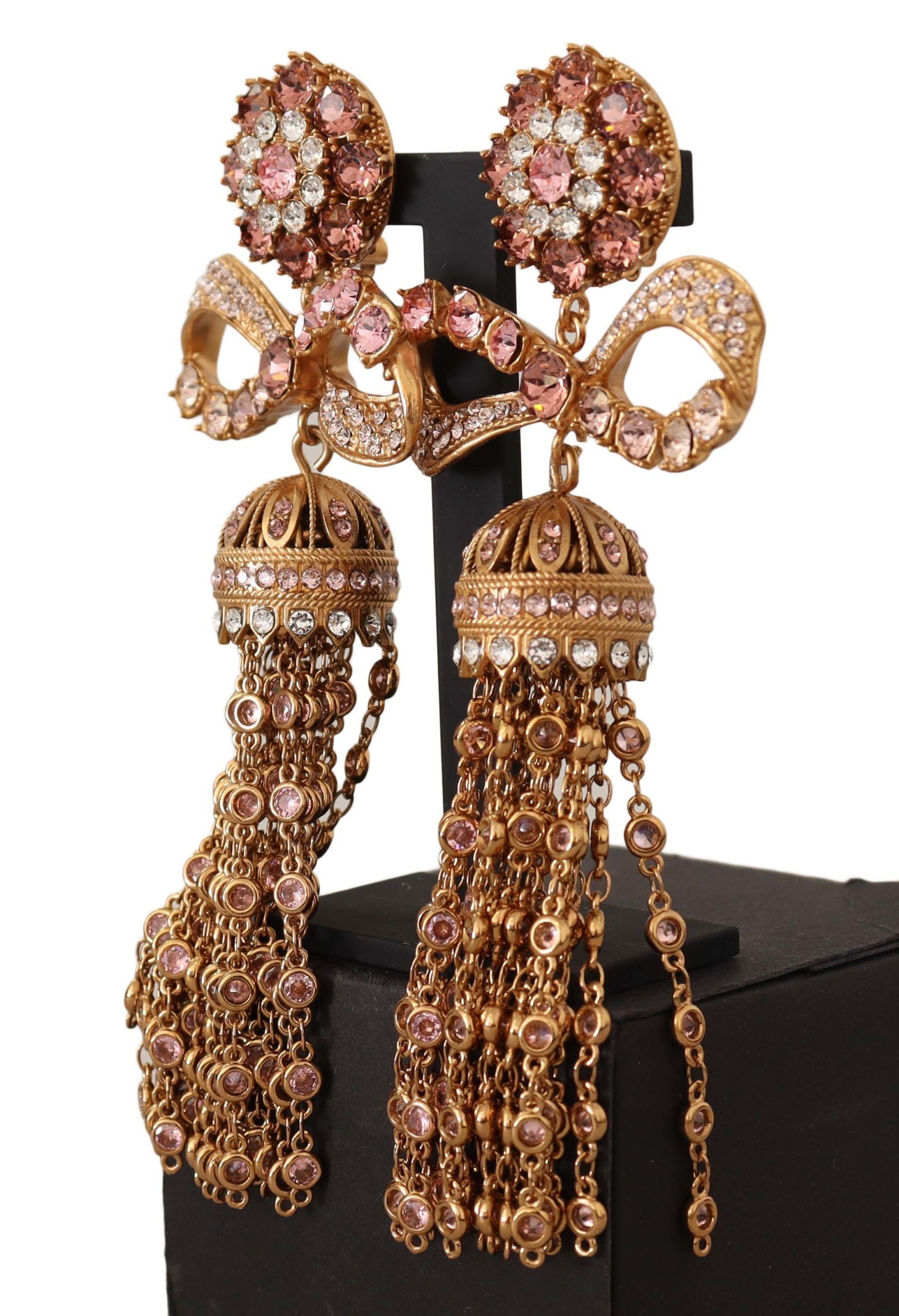 Lange Ohrclips mit baumelnden Kristallen in Gold