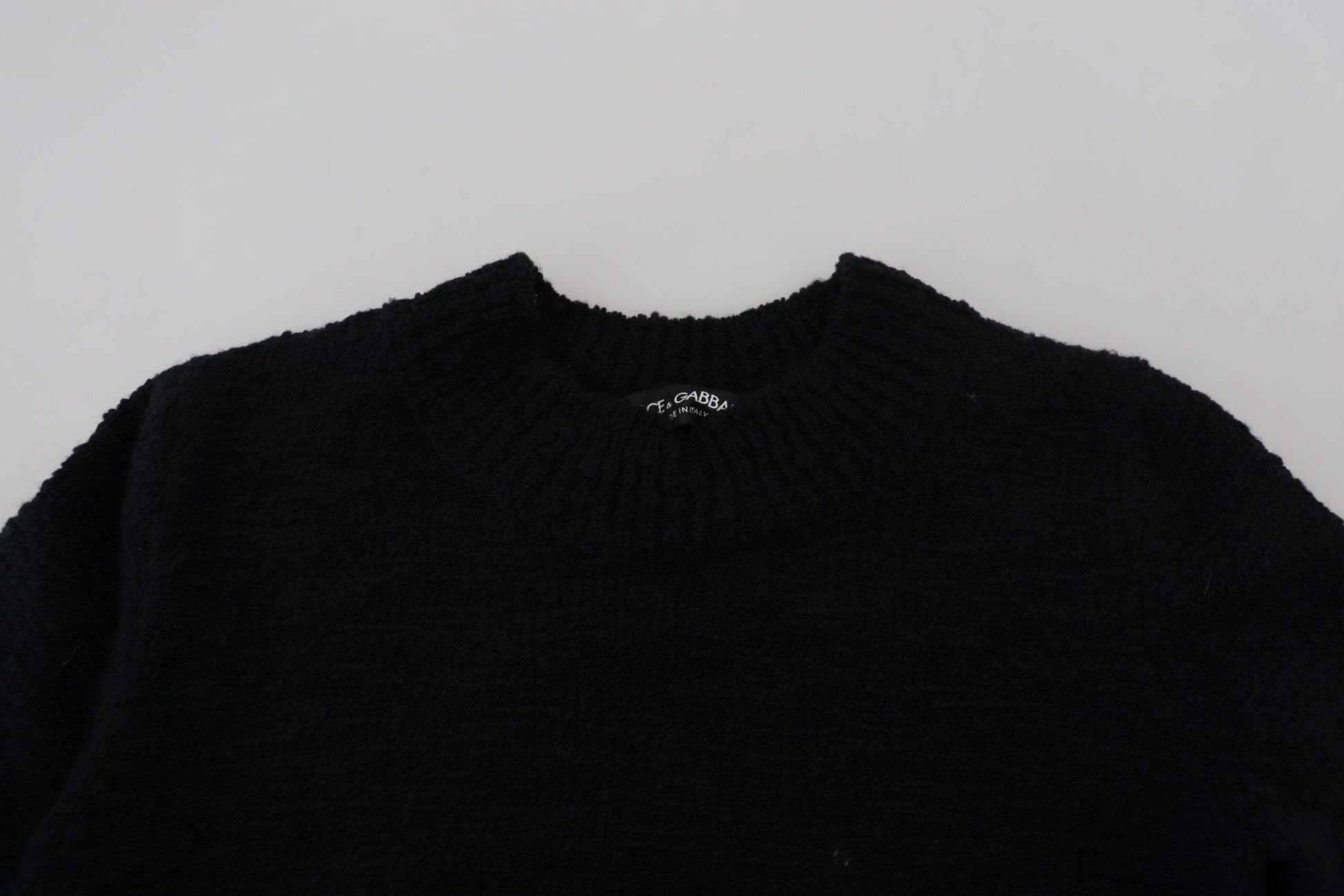 Schwarzer Wollstrickpullover mit Rundhalsausschnitt