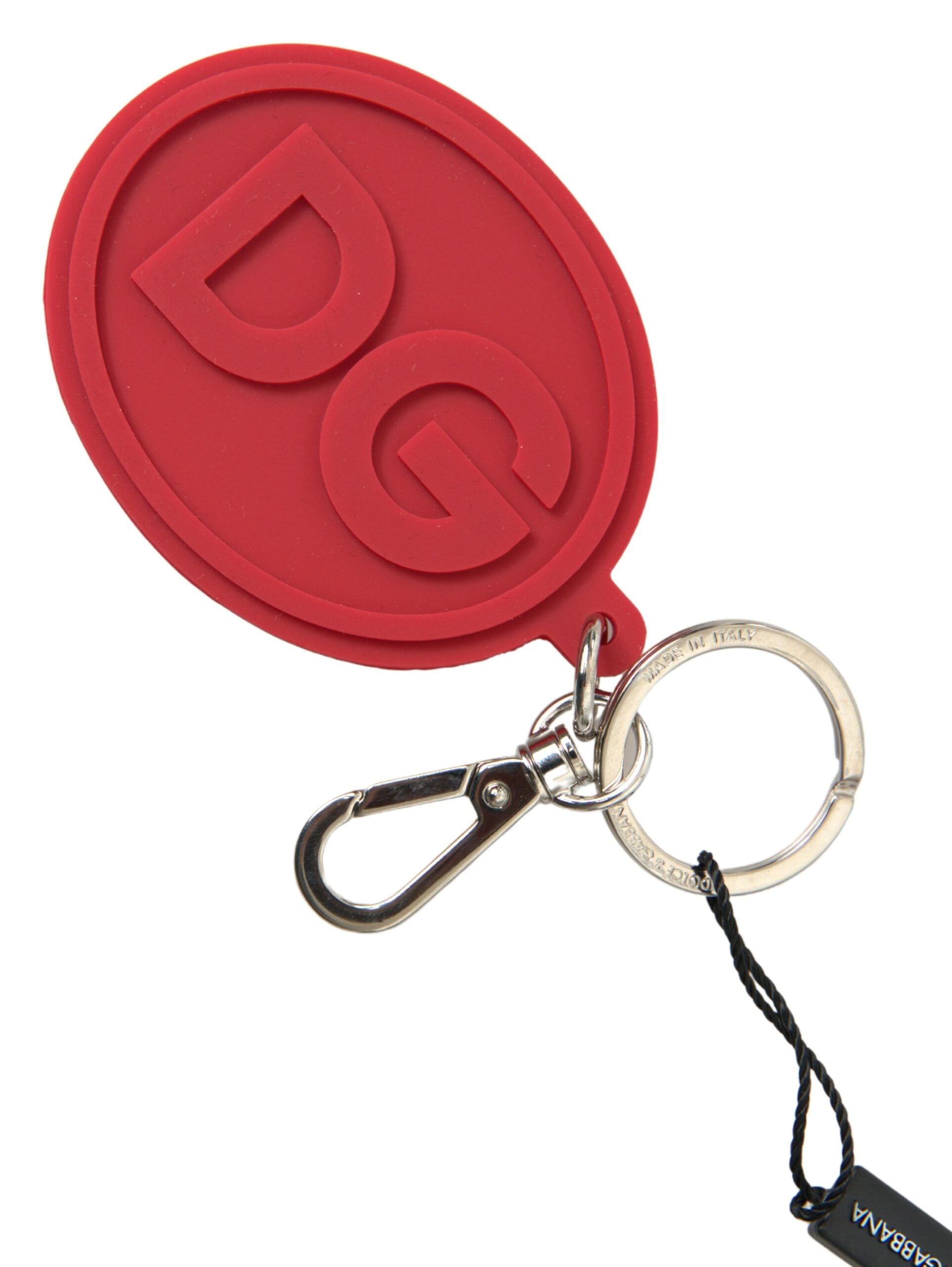 Schlüsselanhänger mit DG-Logo aus rotem Gummi und silbernem Messing