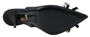 Schwarze Schuhe mit Slingback-Absatz und Kristallverzierung