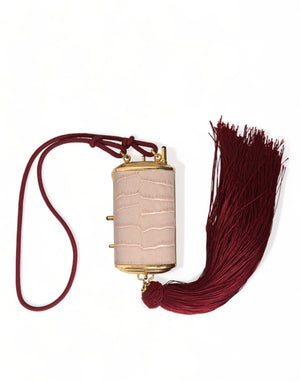 Rosafarbene Mini-Kosmetiktasche aus exotischem Leder mit Spiegel und Quaste