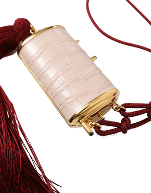 Rosafarbene Mini-Kosmetiktasche aus exotischem Leder mit Spiegel und Quaste