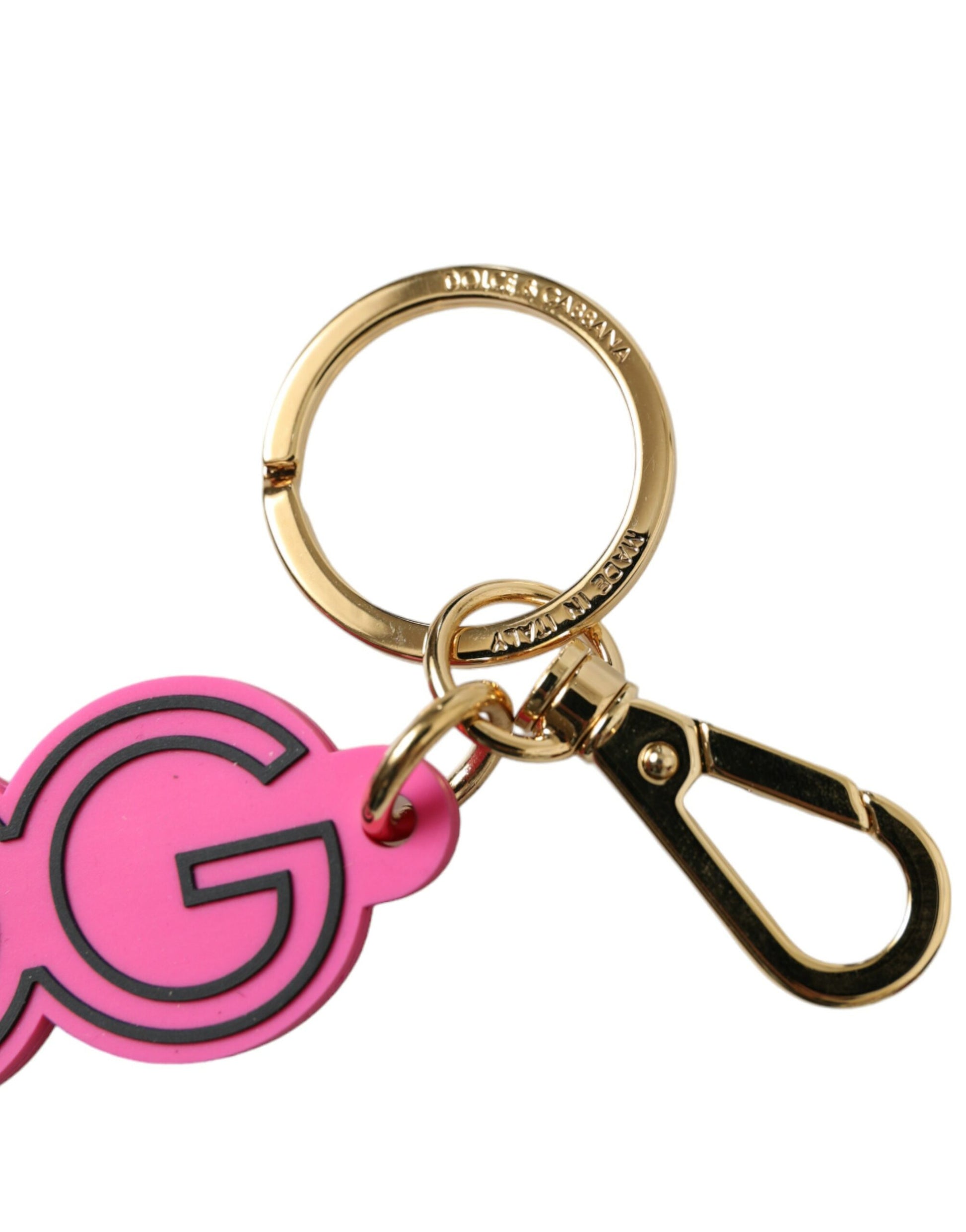 Schlüsselanhänger mit DG-Logo aus rosa Gummi und goldfarbenem Metall
