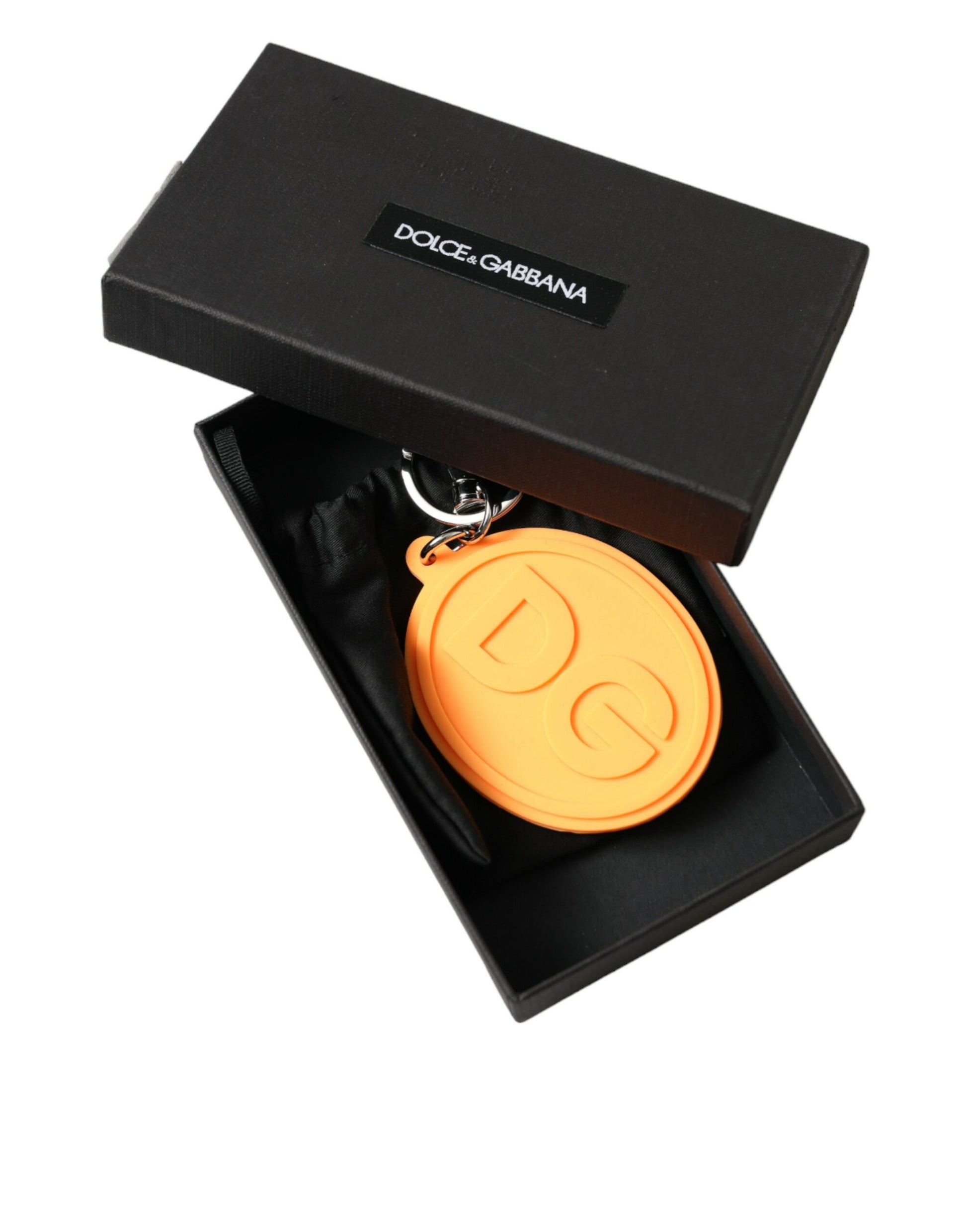 Schlüsselanhänger mit DG-Logo aus orangefarbenem Gummi und silbernem Messingmetall