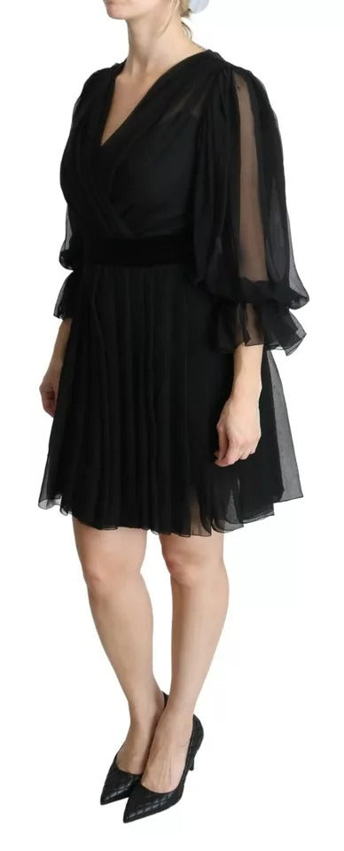 Schwarzes Minikleid aus Seidenmischung mit Netzstoff und Plissee