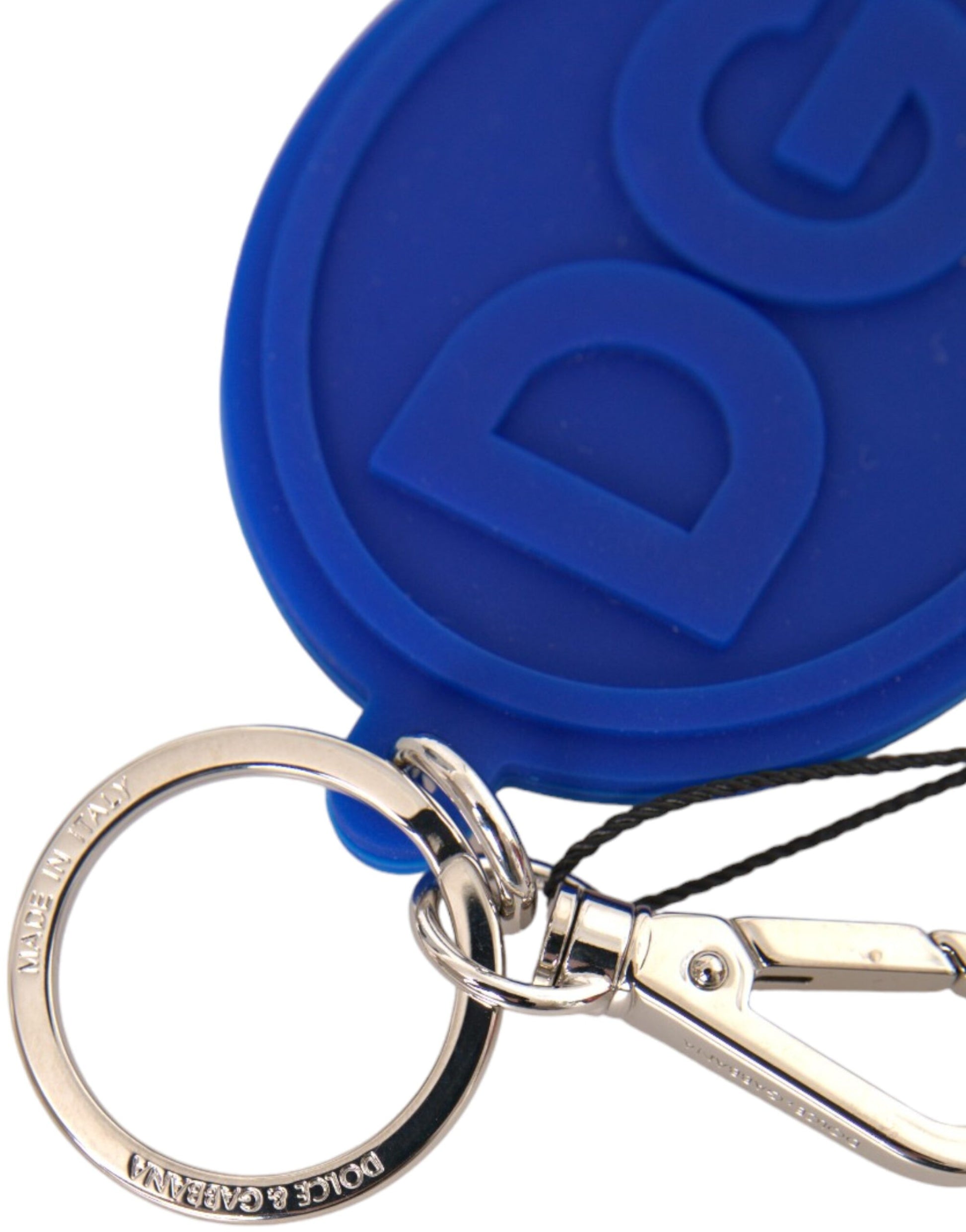 Schlüsselanhänger mit DG-Logo aus blauem Gummi und silbernem Messing