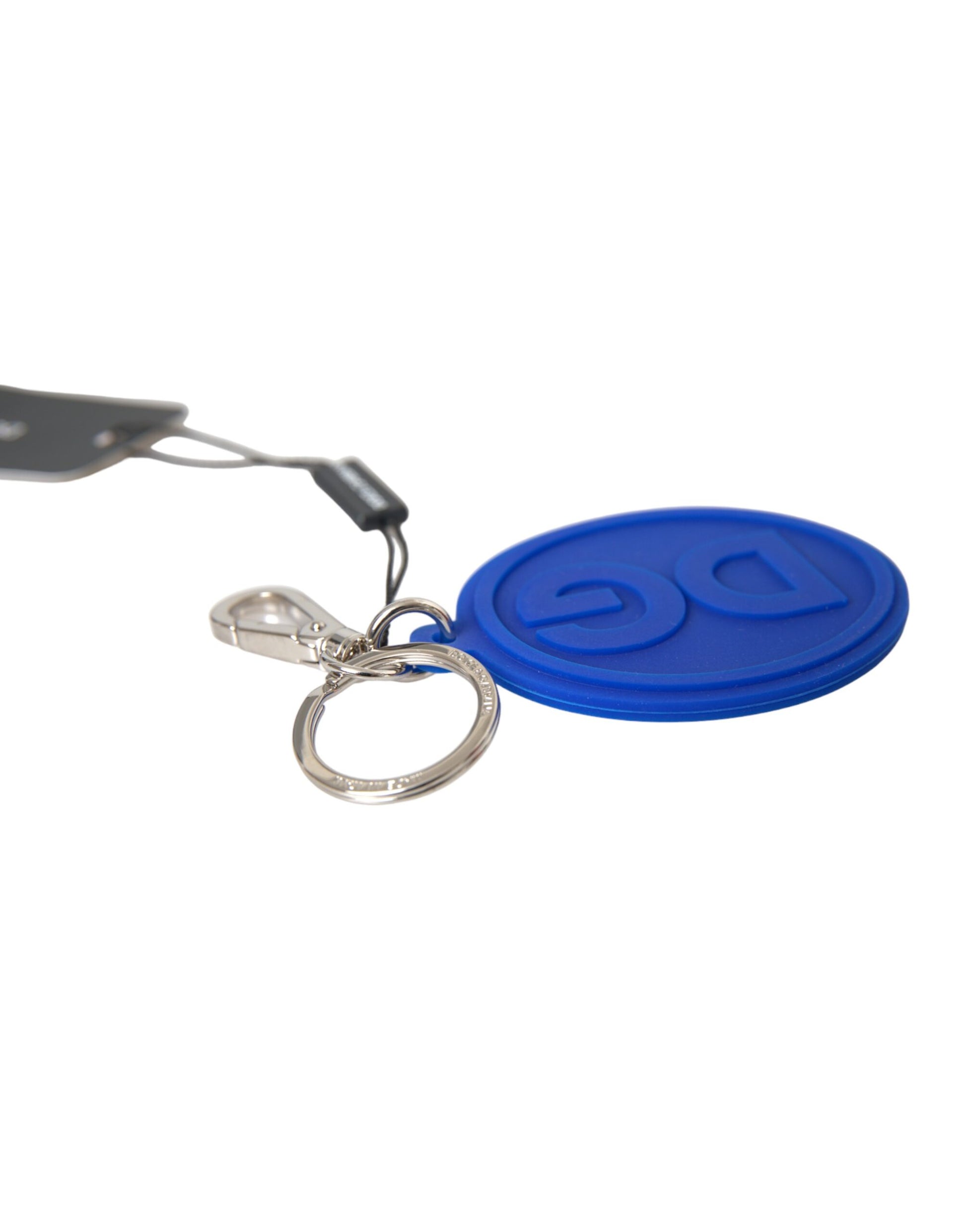 Schlüsselanhänger mit DG-Logo aus blauem Gummi und silbernem Messing