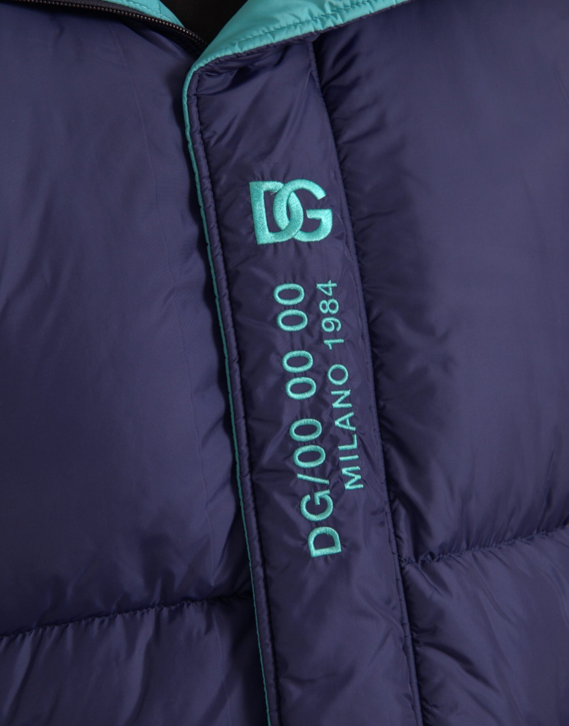Marineblaue, gesteppte Windbreaker-Pufferjacke