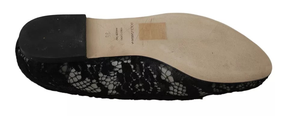 Schwarze Loafer mit Blumenspitze