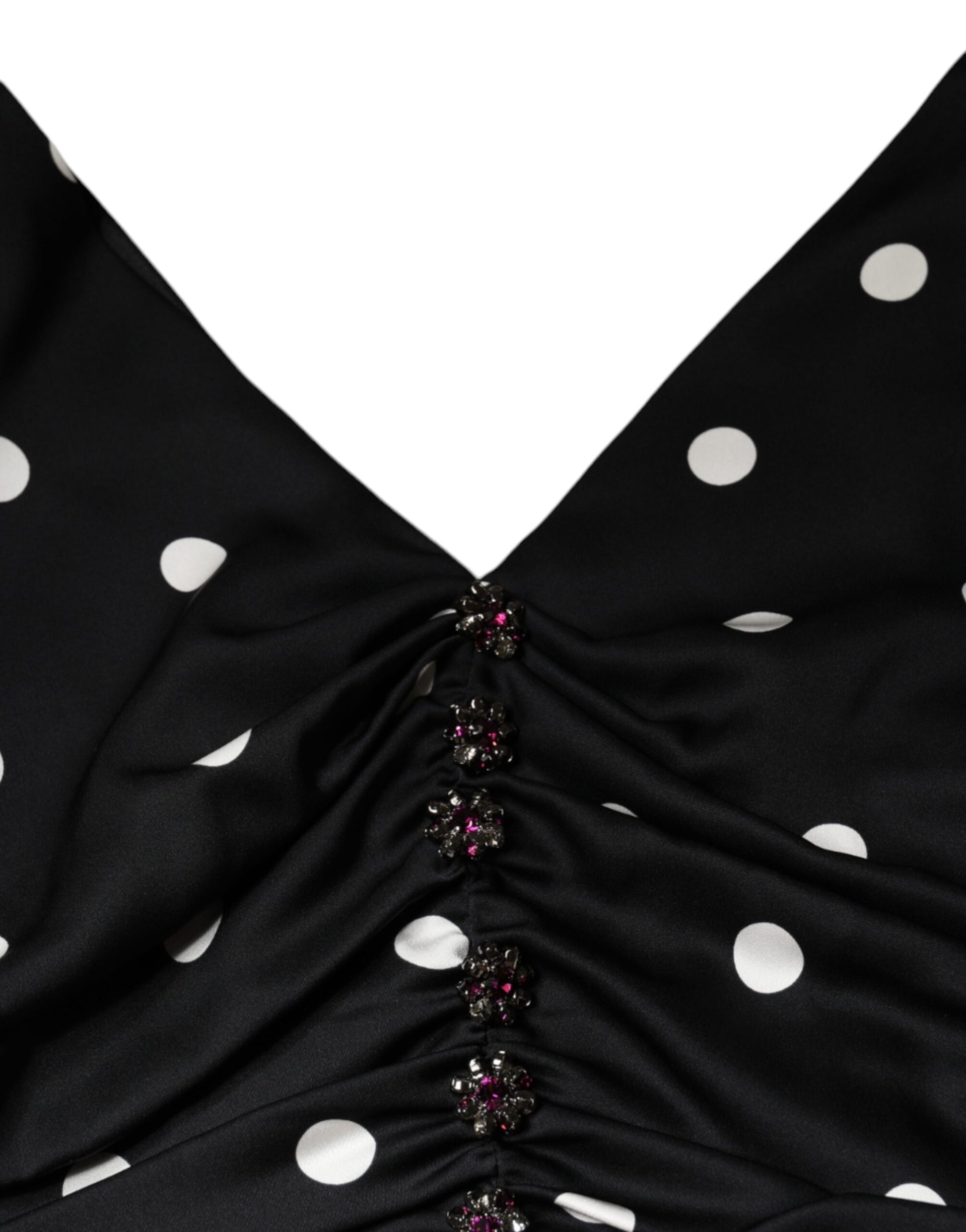 Schwarzes Midikleid aus Seide mit Polka Dots und V-Ausschnitt und Quasten