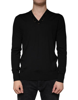 Schwarzer Pullover mit V-Ausschnitt und Verzierung