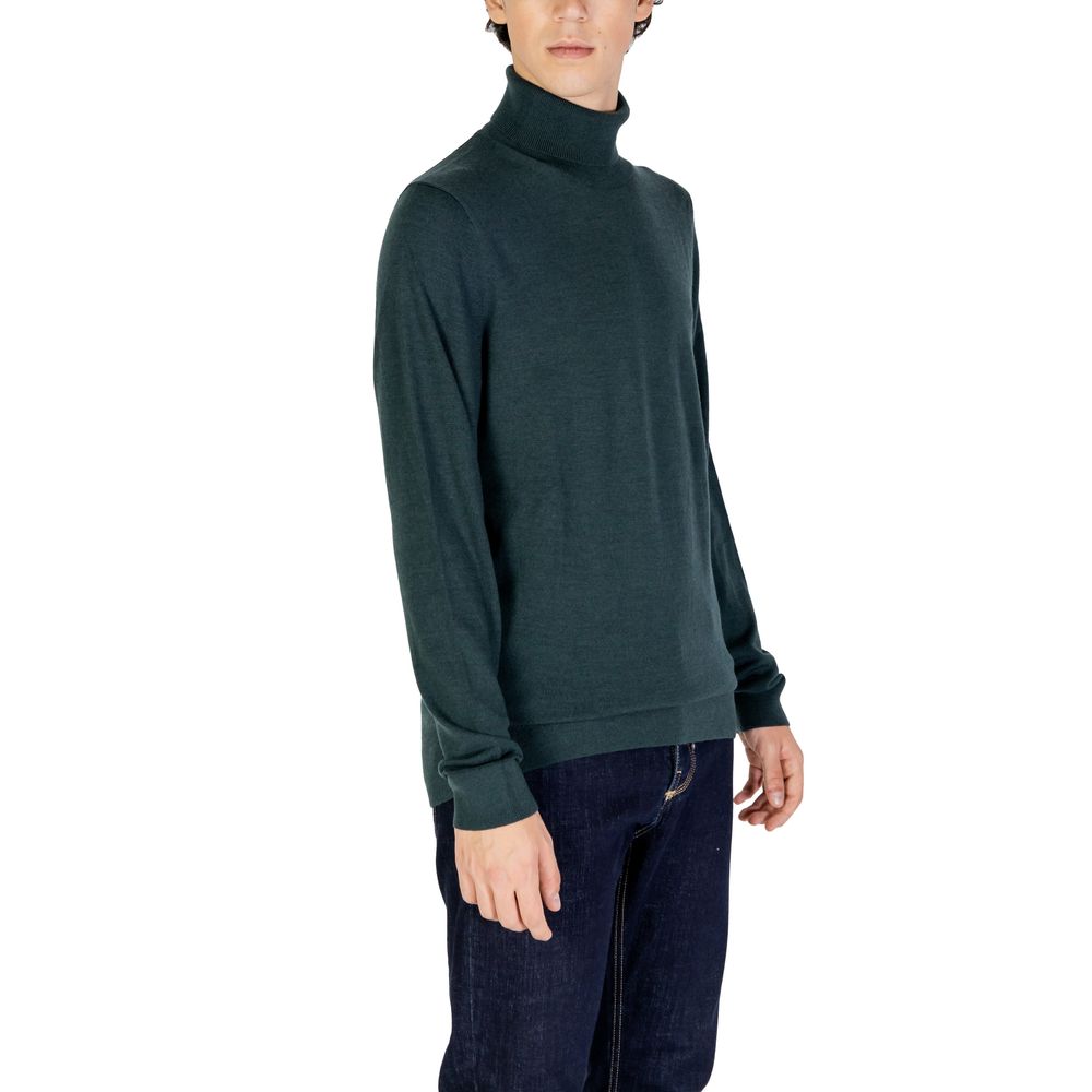 Grüner Rollkragenpullover aus Wolle