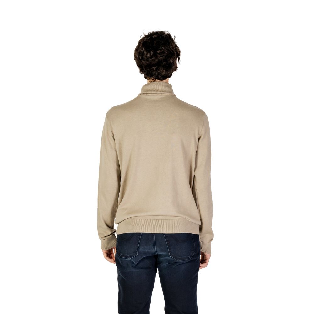 Beigefarbener Rollkragenpullover aus Baumwolle