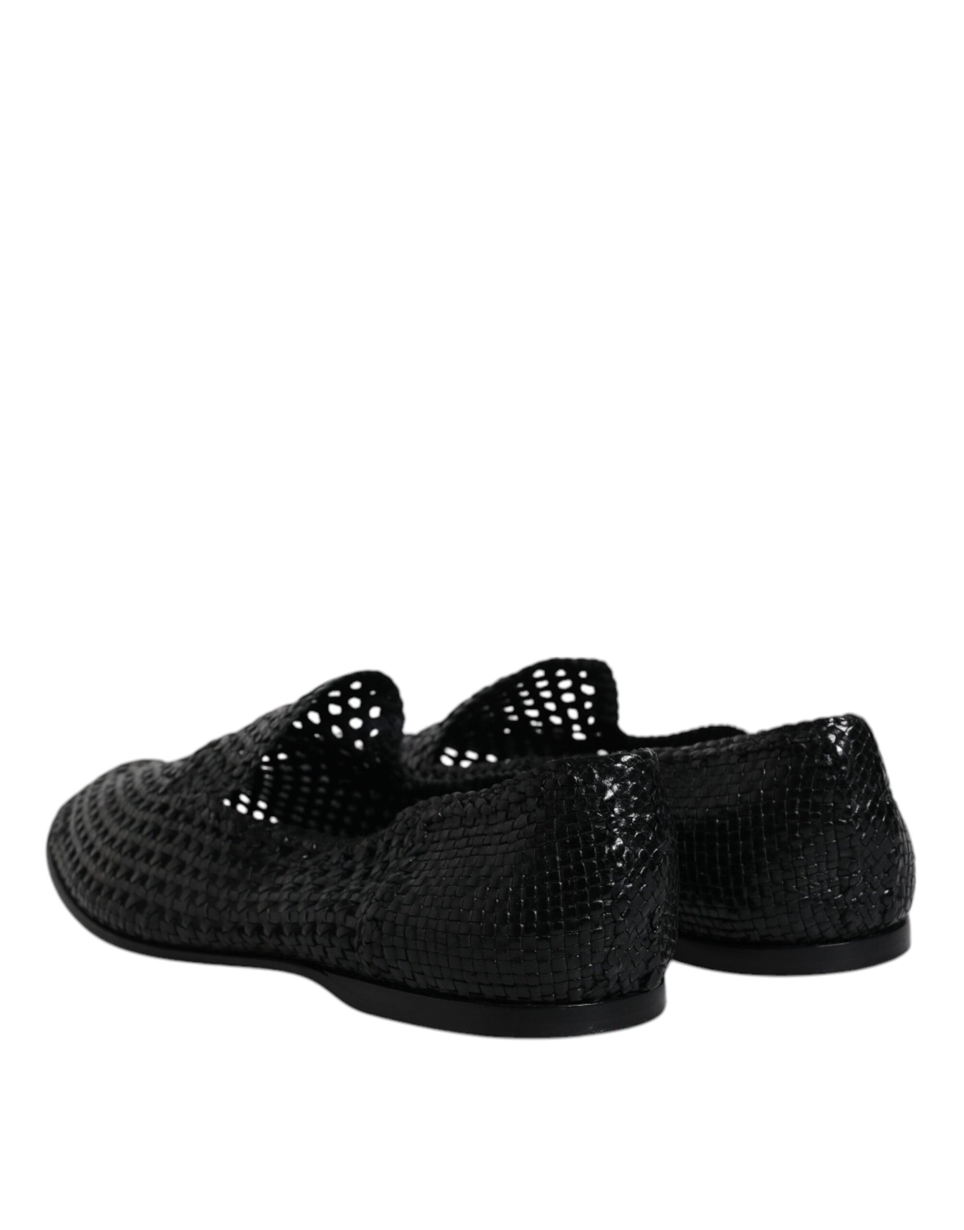 Schwarze Slipper aus gewebtem Leder