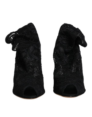 Schwarze Stiefeletten mit Stretch-Absatz und Spitze
