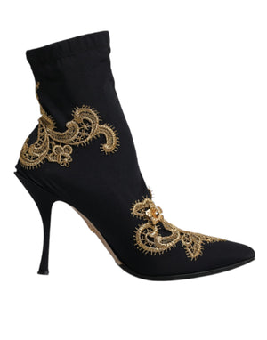 Schwarze Slipper mit goldener Stickerei