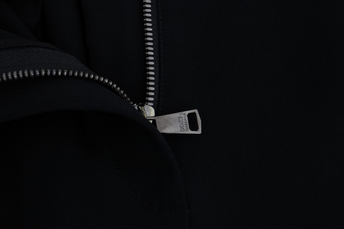 Schwarze Stretch-Caprihose mit rosa Streifen