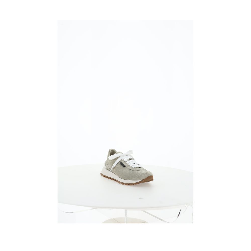 Sneaker mit ikonischen Verzierungen