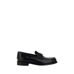 Loafer mit dreieckiger Plakette
