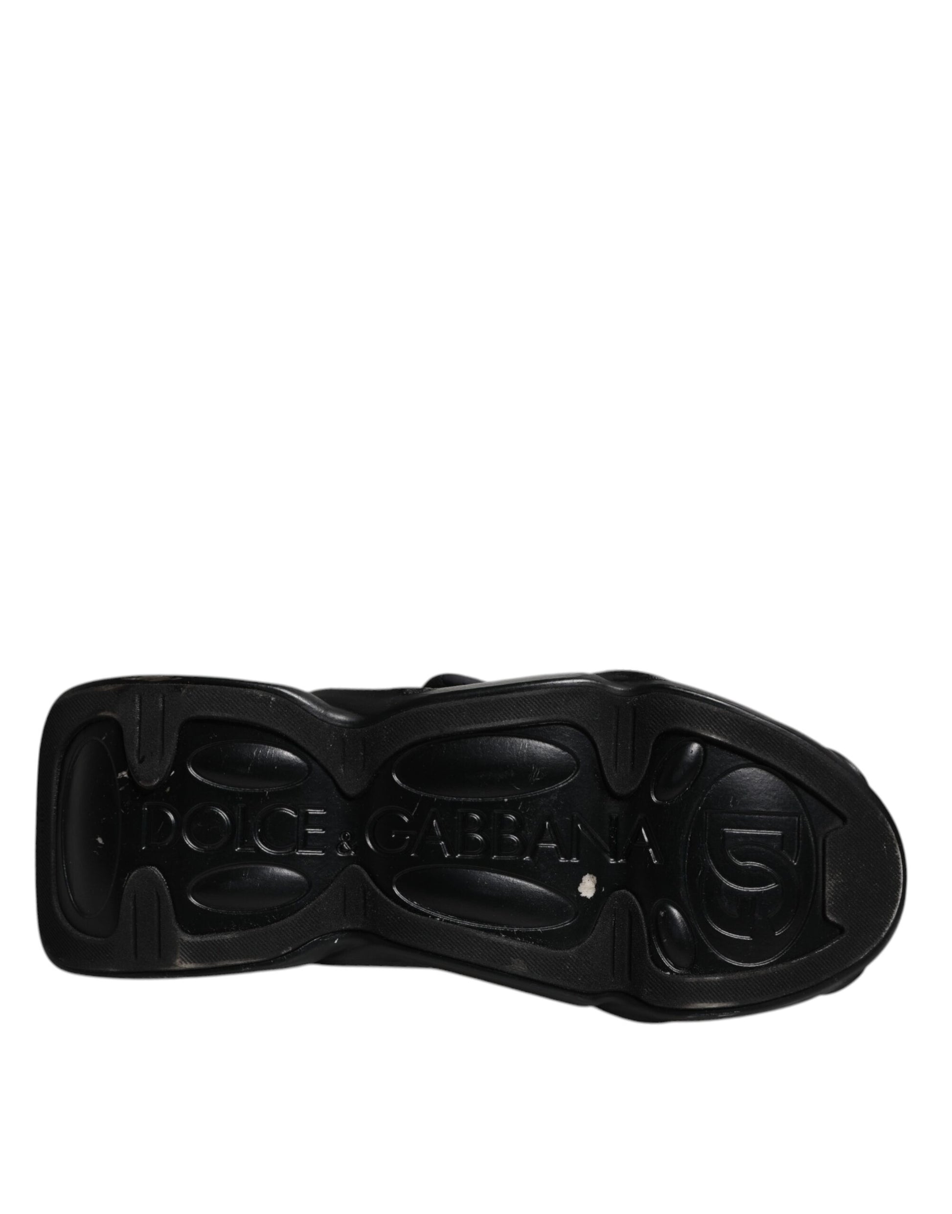 Schwarze Slip-On-Sneakers mit Wellensteppung