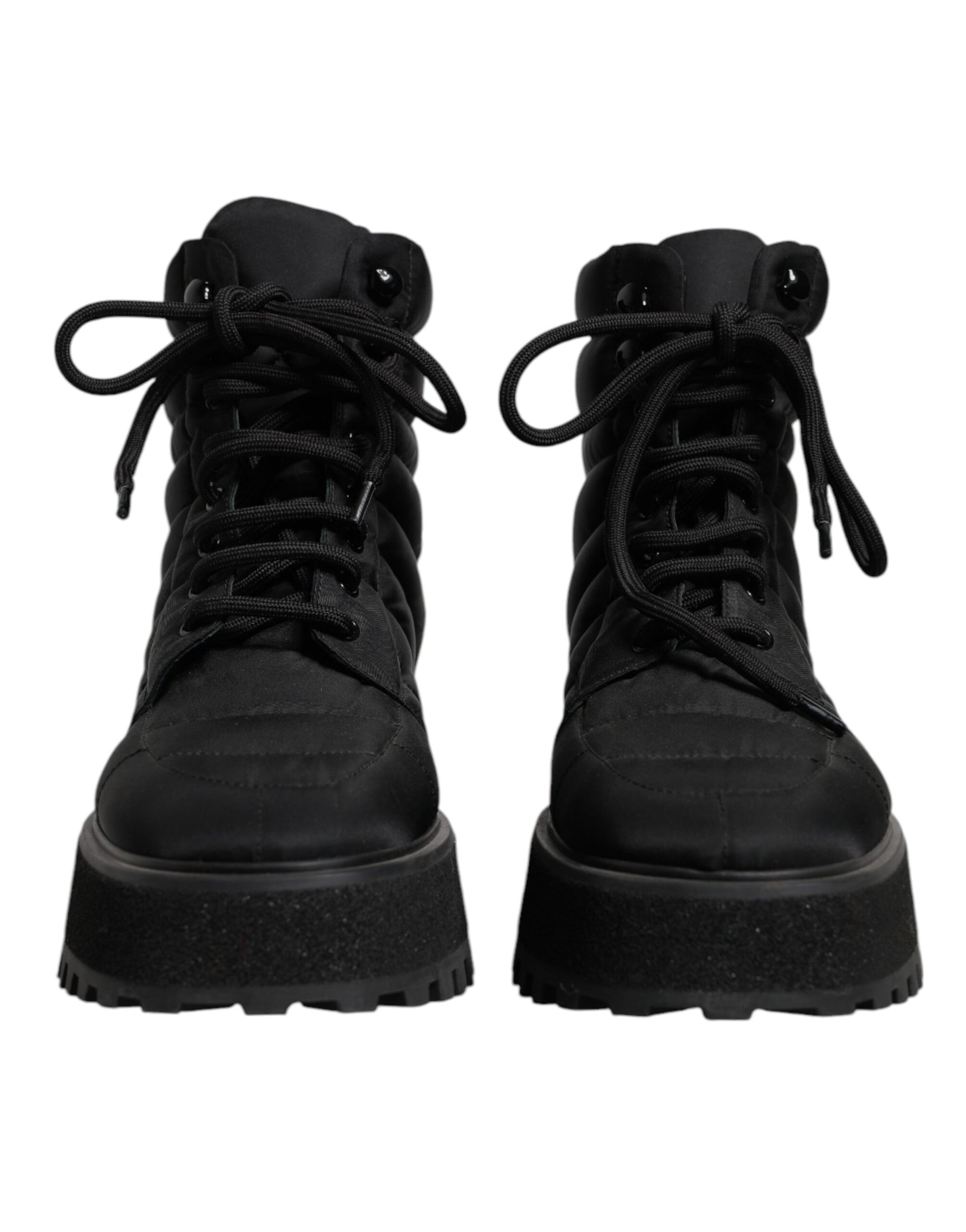 Schwarze, gepolsterte, wadenlange Schnürstiefel