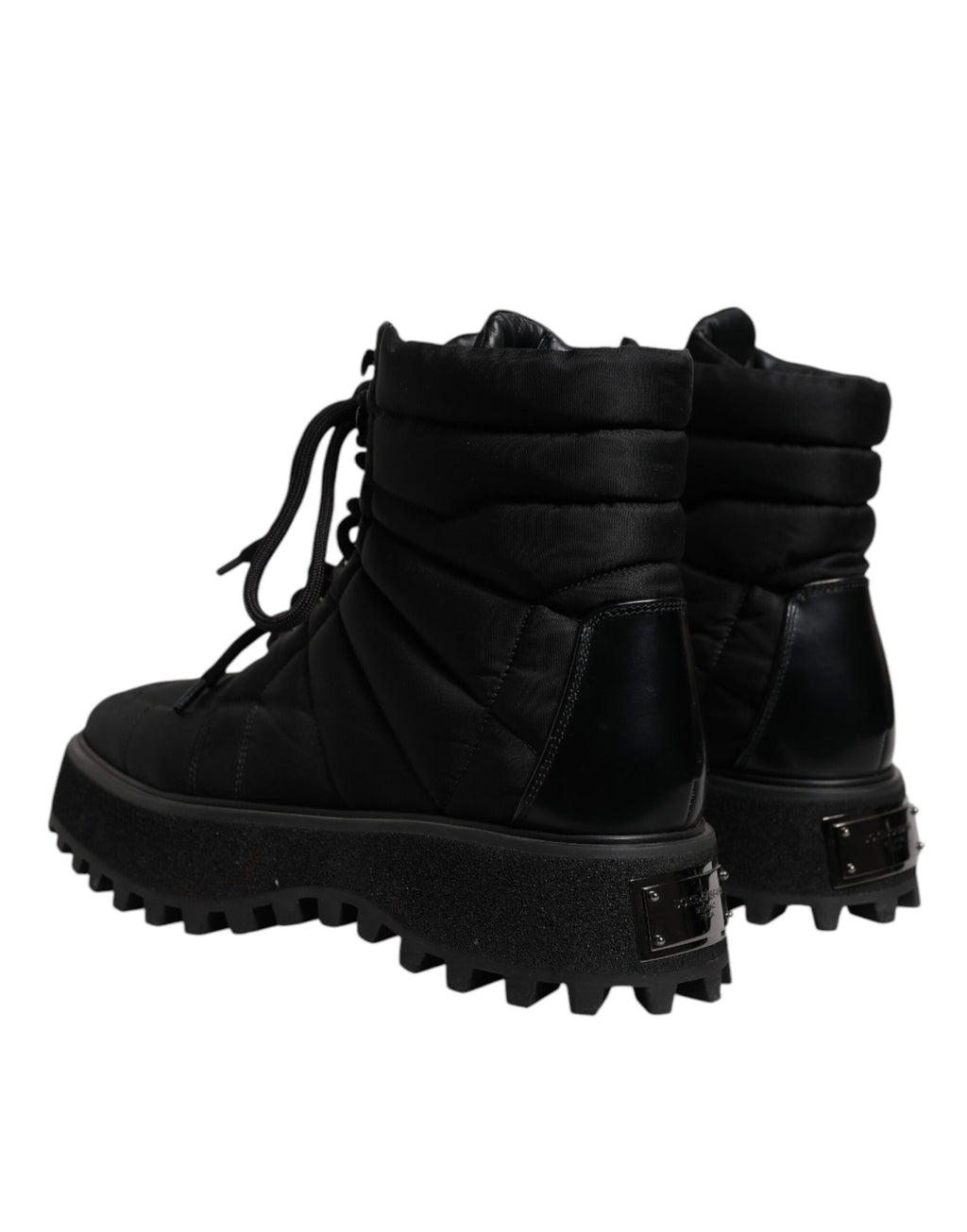 Schwarze, gepolsterte, wadenlange Schnürstiefel
