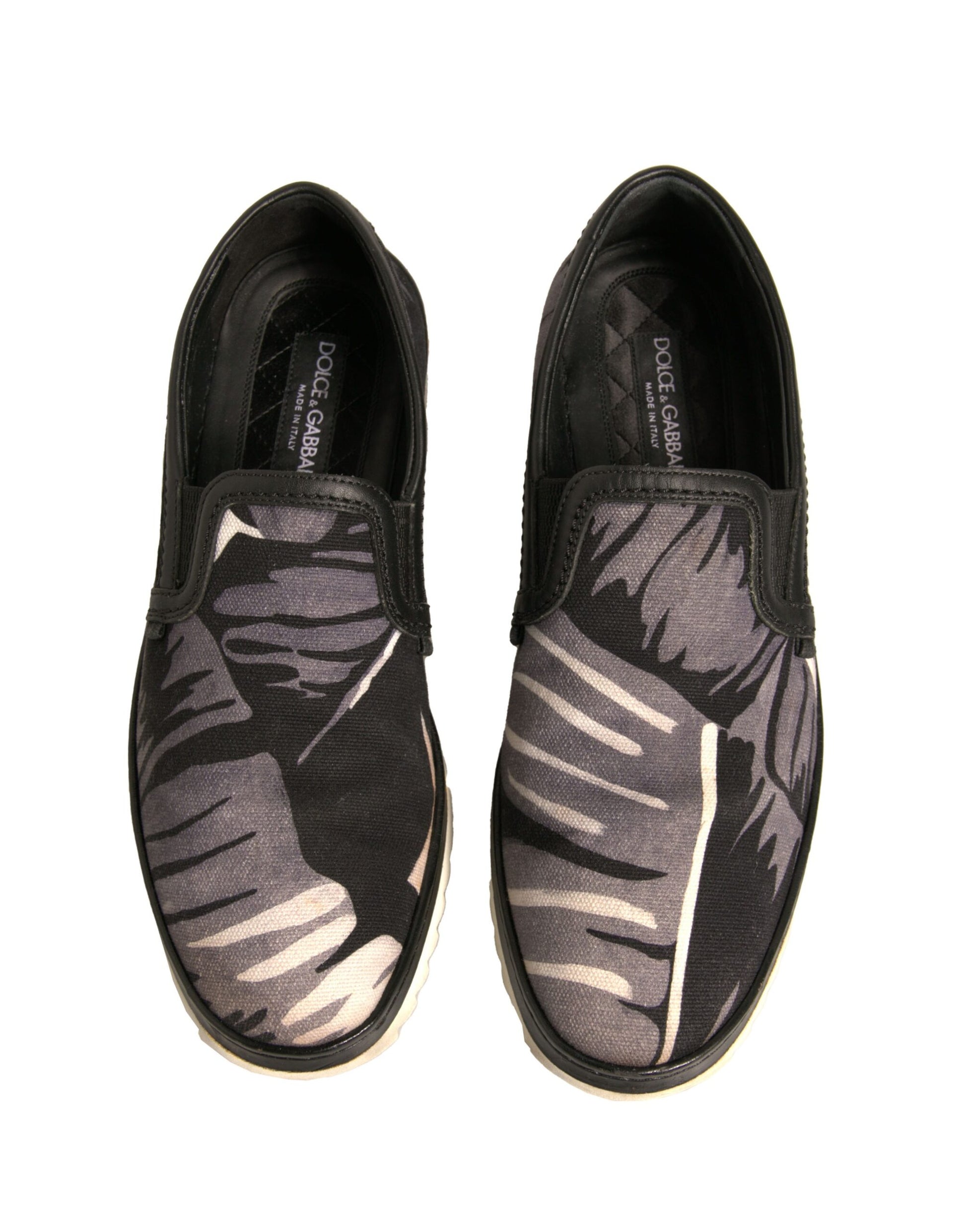Schwarze Slipper aus Canvas mit tropischem Print