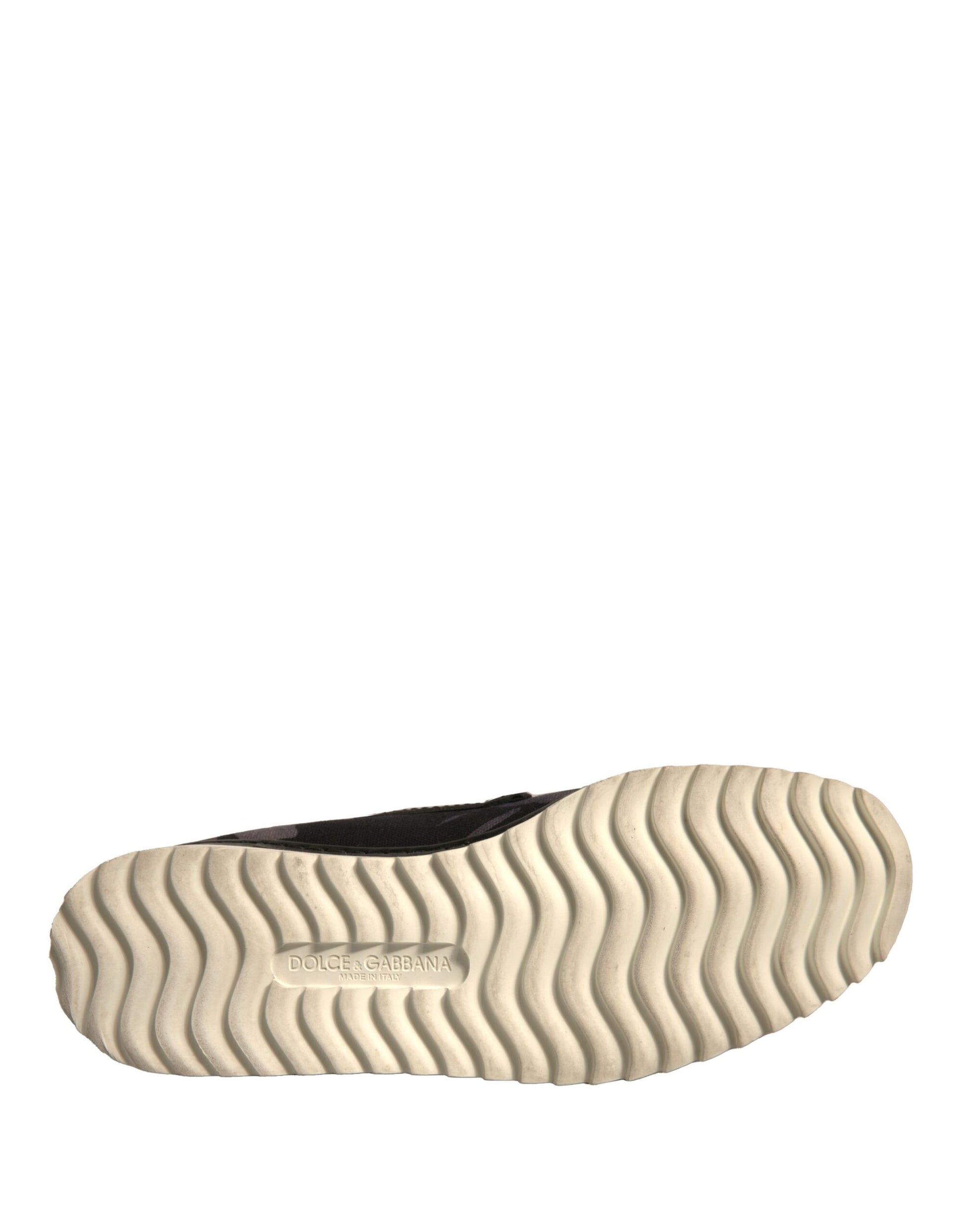 Schwarze Slipper aus Canvas mit tropischem Print