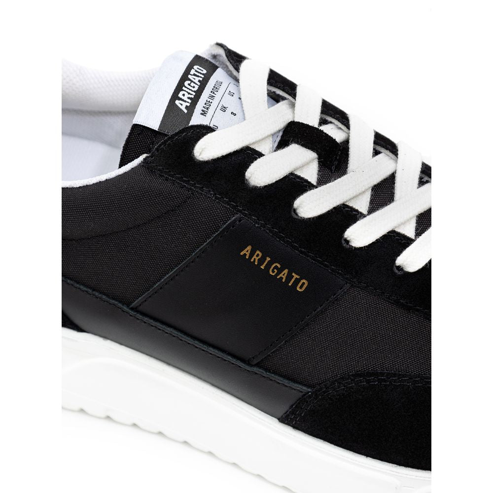 Sneaker aus Stoff und Leder in Schwarz und Weiß