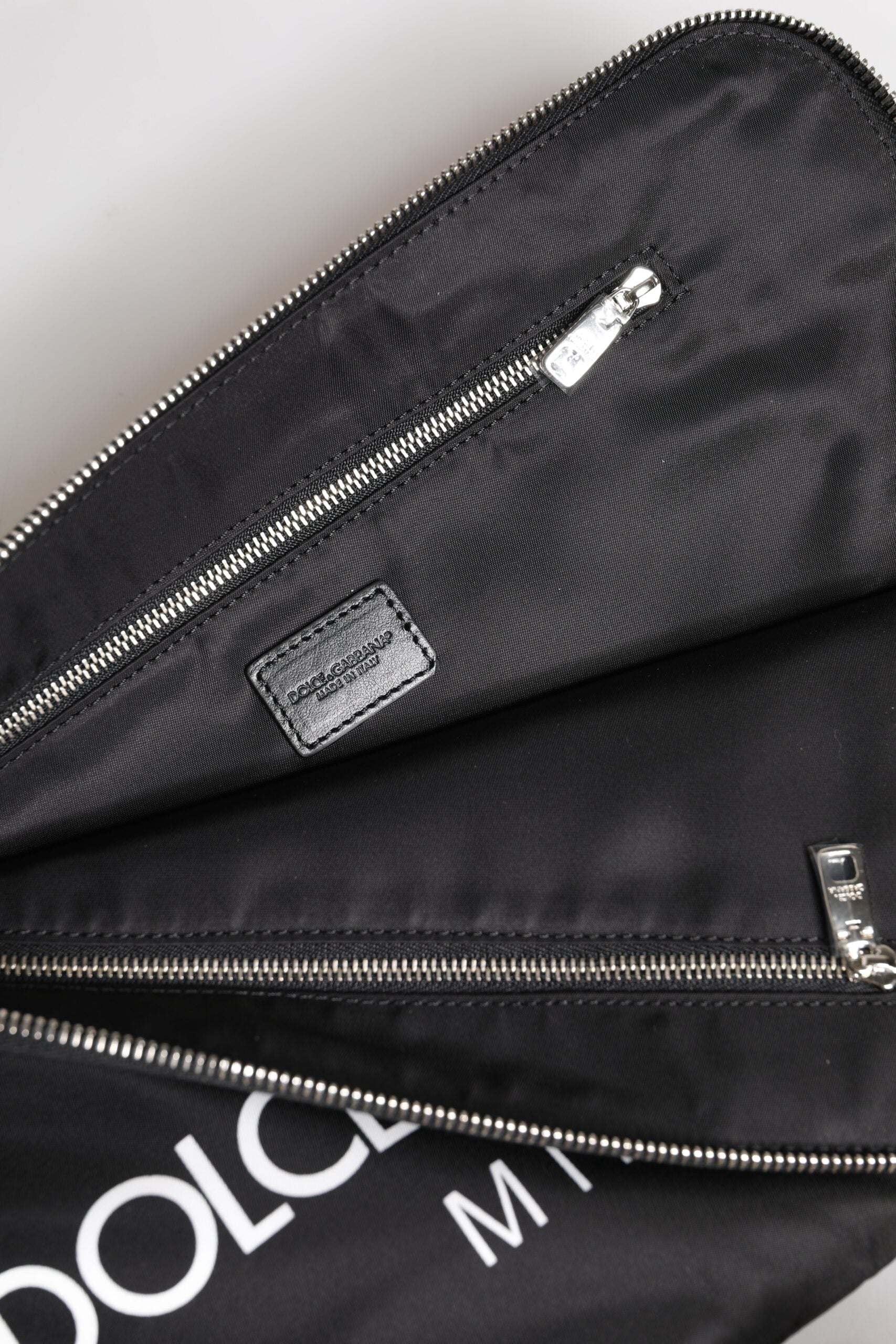 Schwarze Clutch aus Nylon mit DG Milano-Print