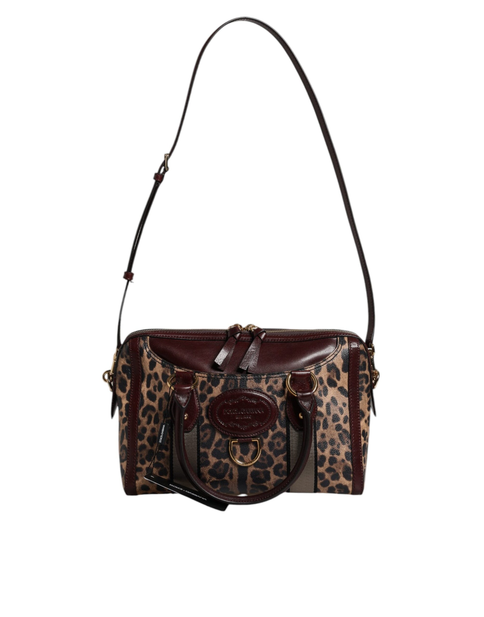 Reisetasche aus braunem Leder mit Schultergurt und Leopardenmuster