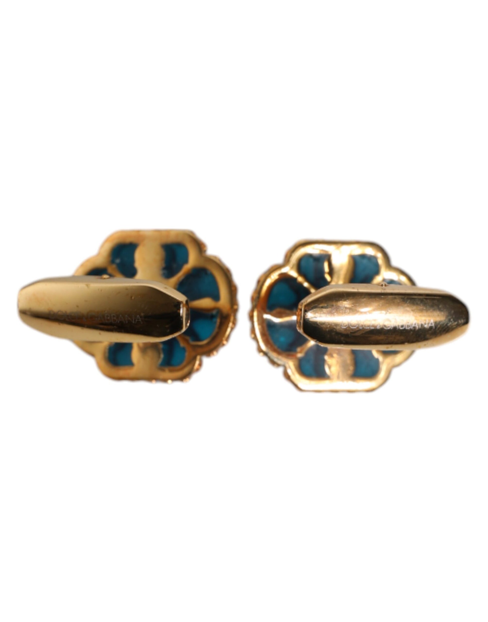 Manschettenknopf aus goldfarbenem Messing mit blau emaillierter Blume