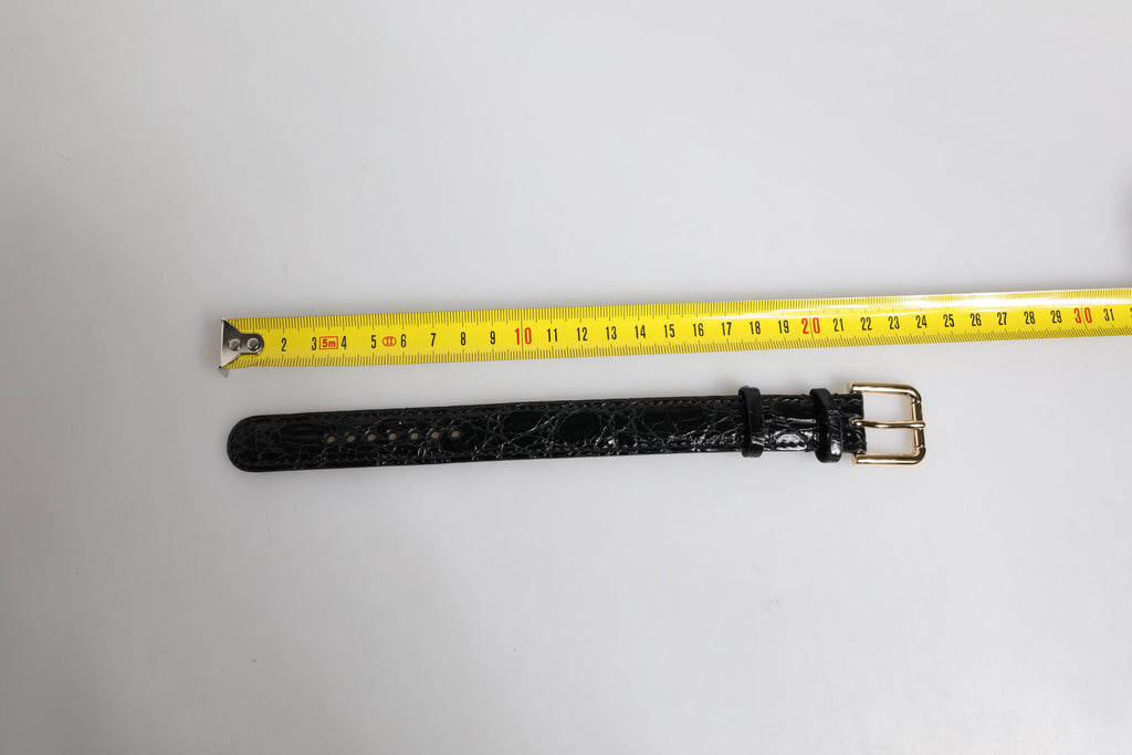 Armband aus schwarzem Exotenleder mit goldfarbener Metallschnalle