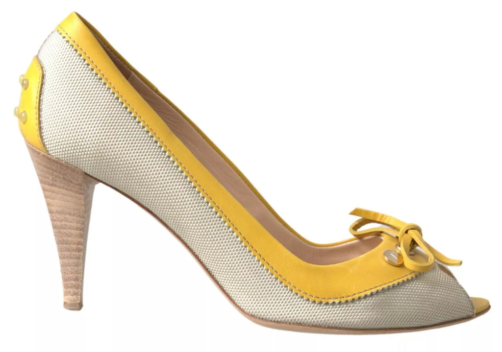 Gelbe, cremefarbene Peep-Toe-Pumps mit Absatz