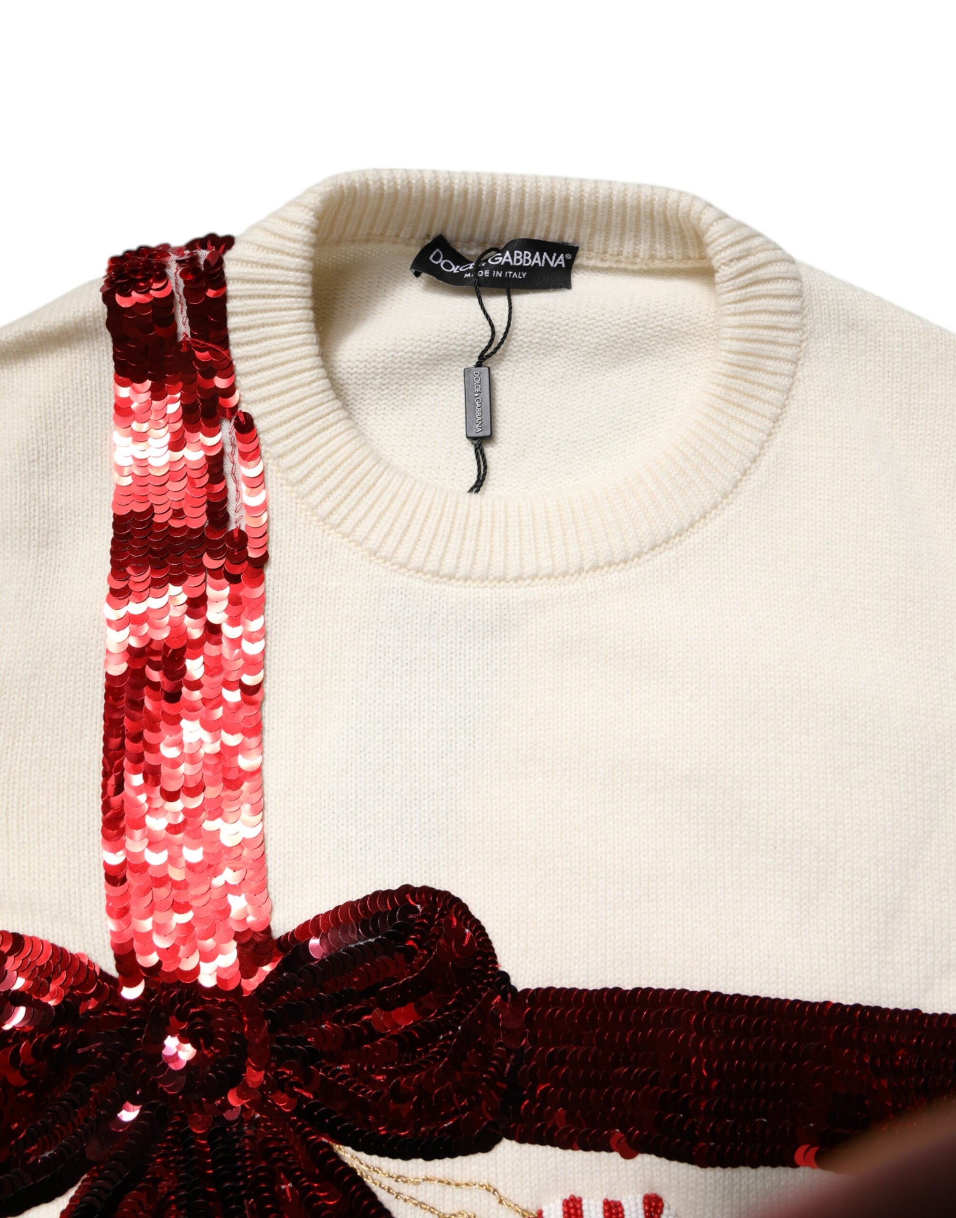 Weißer Pullover mit Rundhalsausschnitt und Pailletten