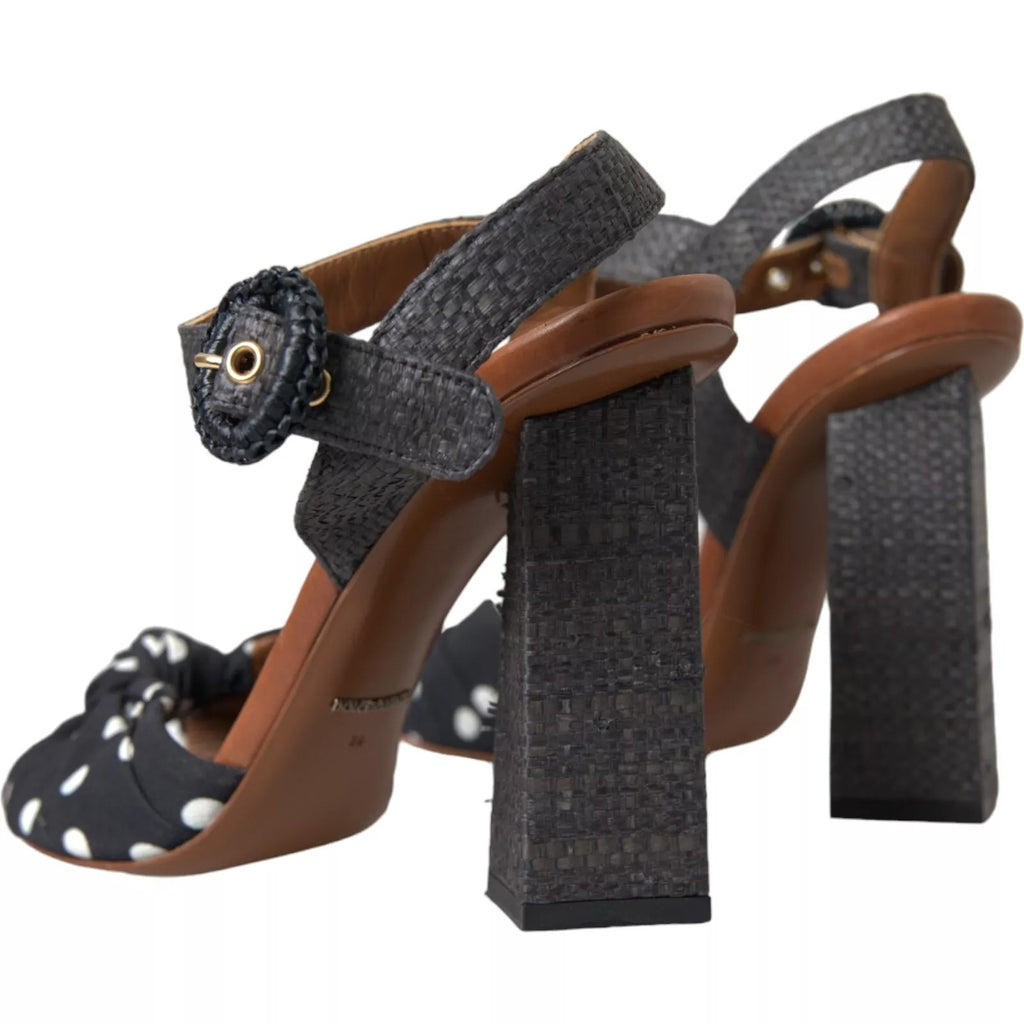 Schwarze gepunktete Leder-Sandalen mit Absatz