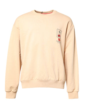 Beigefarbener Pullover mit Rundhalsausschnitt und Kirschmuster
