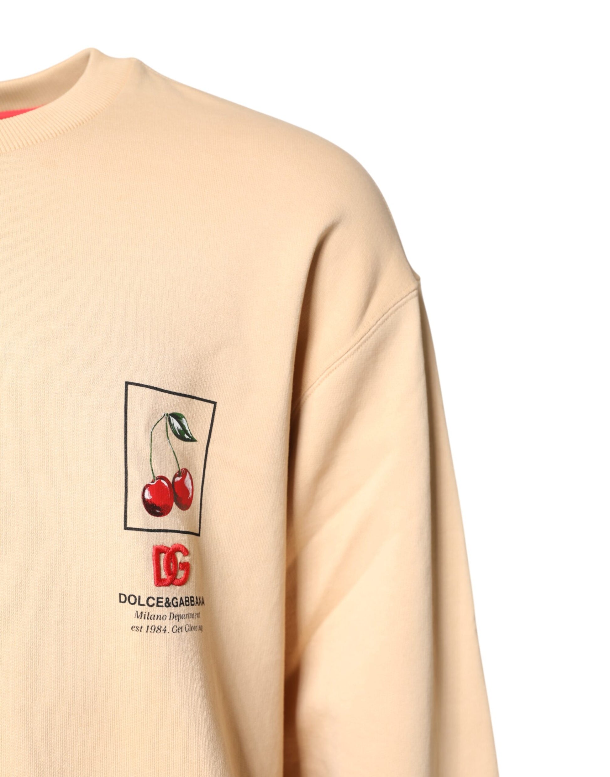 Beigefarbener Pullover mit Rundhalsausschnitt und Kirschmuster