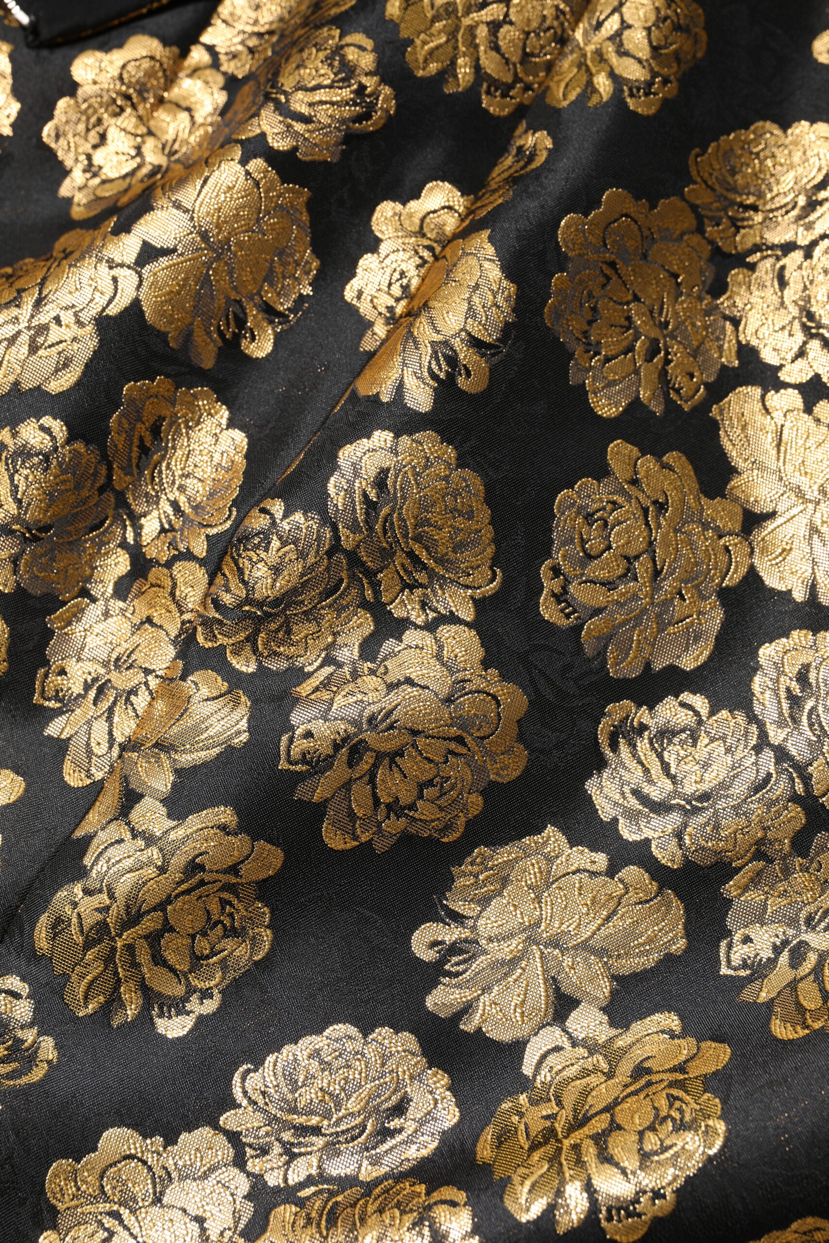 Schwarz-goldener Jacquard-Minirock mit Blumenmuster