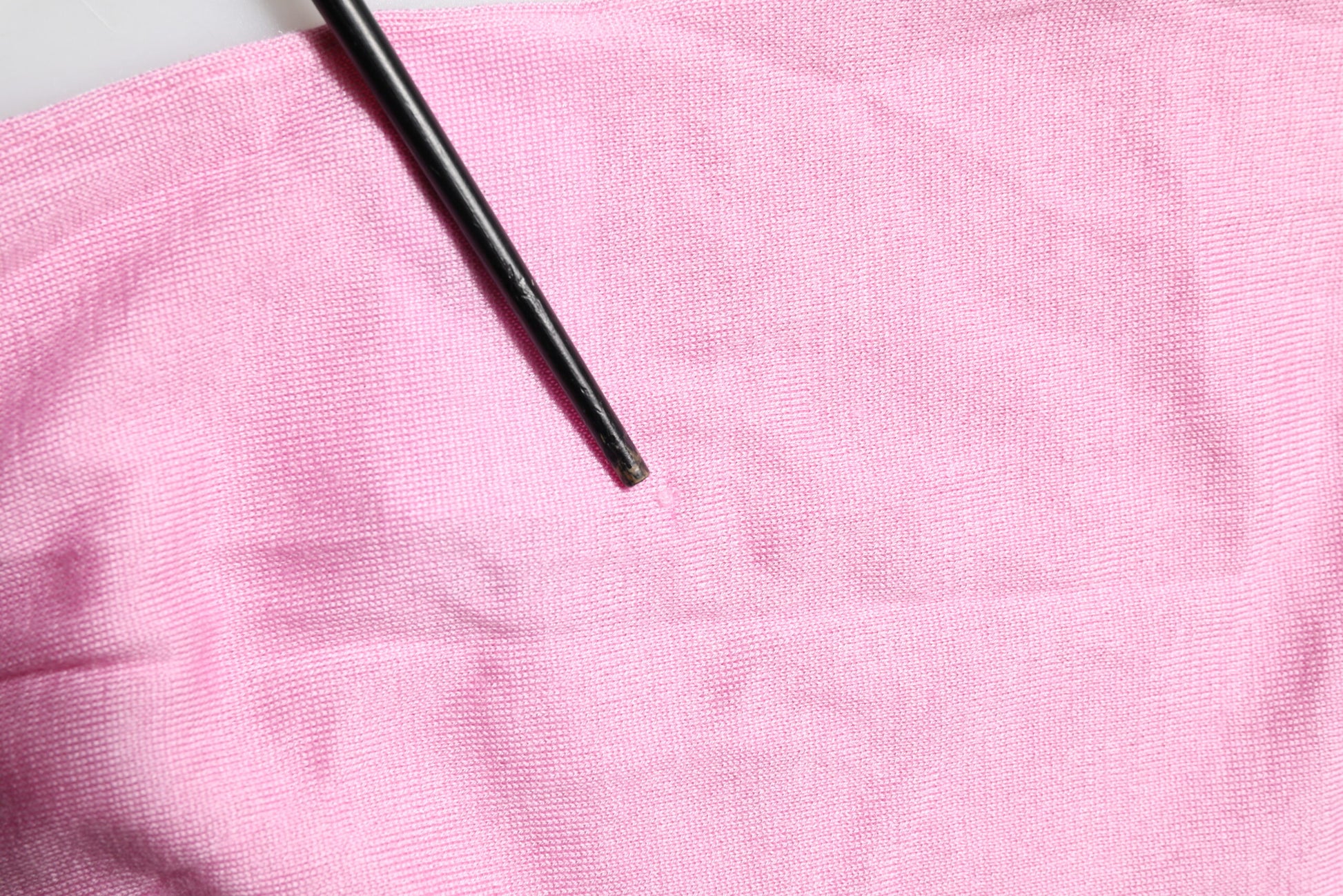 Rosa Strickjacke mit Blumendetail