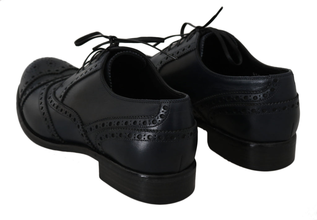 Dunkelblaue Oxford-Schuhe aus Leder mit Flügelkappe